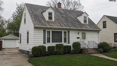 A weathered cedar shake roof on a home in the Milwaukee area