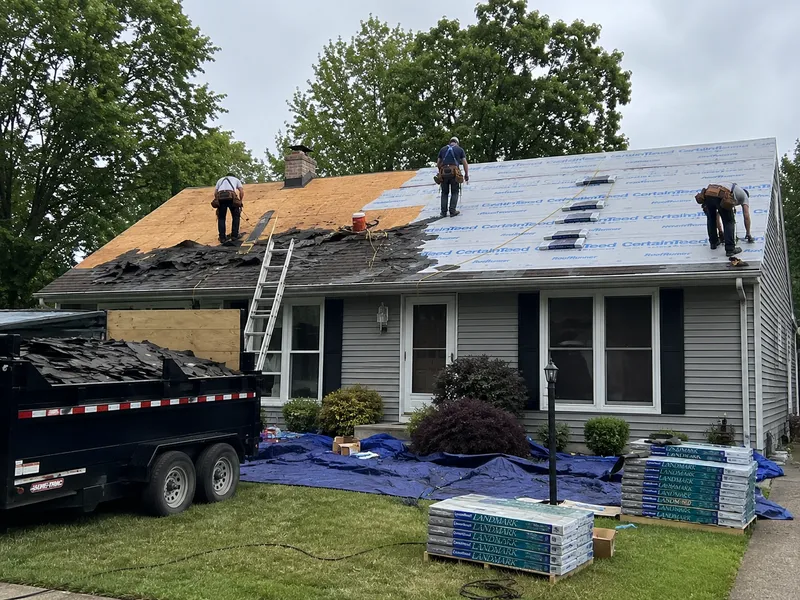 A full roof tear-off and replacement in progress on a Milwaukee-area home