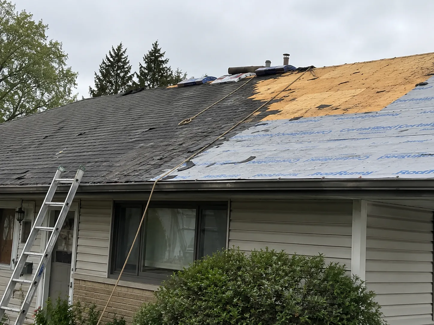 Roof replacement in progress on a Milwaukee-area home